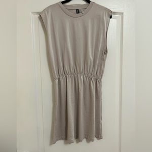 Grey t shirt dress with a fun little twist in the elastic waist band!
